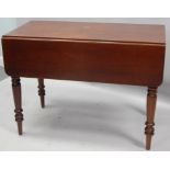 A Victorian mahogany Pembroke table, the top with rounded corners, above a frieze drawer, on