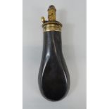 A copper and brass powder flask, stamped Drams.