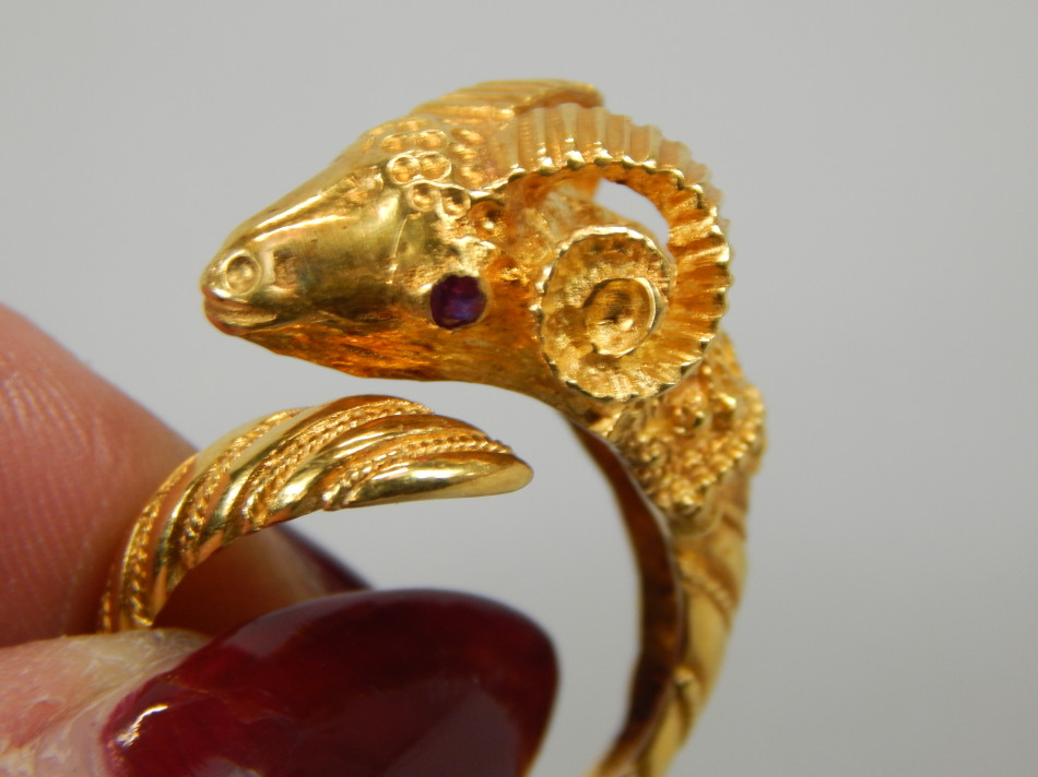 A ram's head ring, the head set with two rubies, yellow metal, marked 750, 9.1g all in. - Image 3 of 3