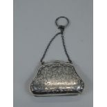 A George V silver purse, engraved with foliate scrolls, etc, Birmingham 1913.