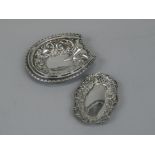 Two Edwardian silver bonbon dishes, one shaped in the form of a horseshoe, with pierced borders,