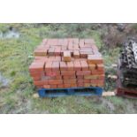 A quantity of rustic bricks.