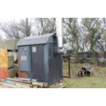 A Classic outdoor wood furnace/boiler. (This lot requires a complete re-wiring). Height not