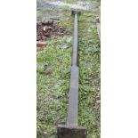 A solid cast iron Stanchion, length 3.7m approx.