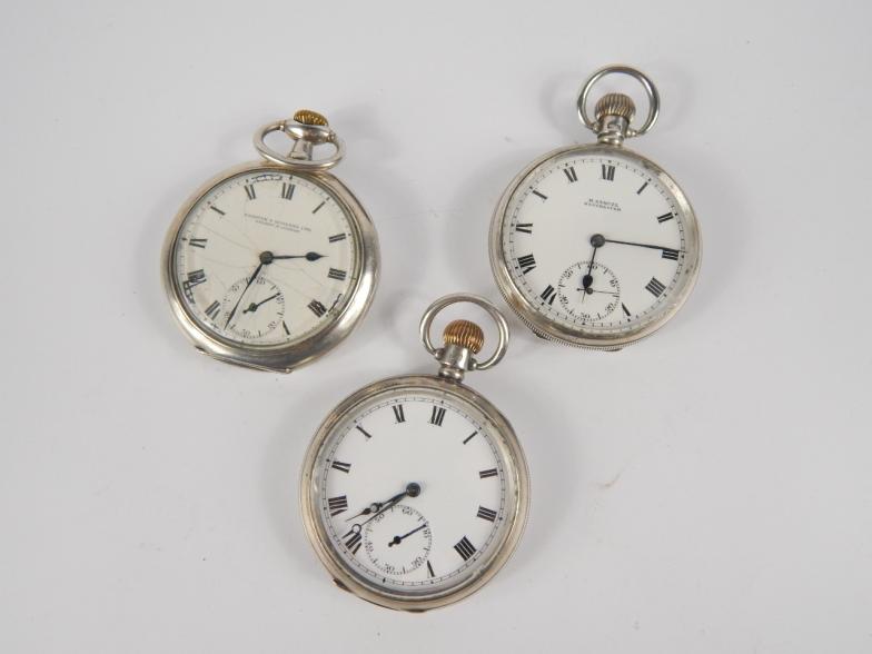 A silver open faced keyless wind gentleman's pocket watch, enamel dial bearing Roman numerals,