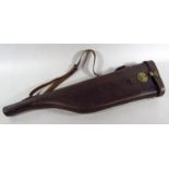 A leather leg of mutton gun case, marked T.P.B.