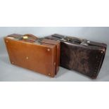 An early 20thC pressed leather travel case, with chrome mounts, 20cm high, 60cm wide, 41cm deep, and