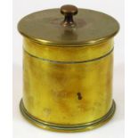 A WWI brass trench art tobacco jar, formed from a shell marked T1917 to one end and T918 to the