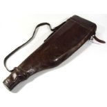 A 20thC leather leg of mutton gun case, with adjustable strap, initialled to the body, 74cm wide.