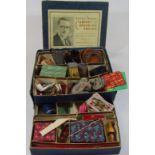 An early 20thC Ernest Sewell Cabinet of Conjuring Tricks child's magic set, the card packaging