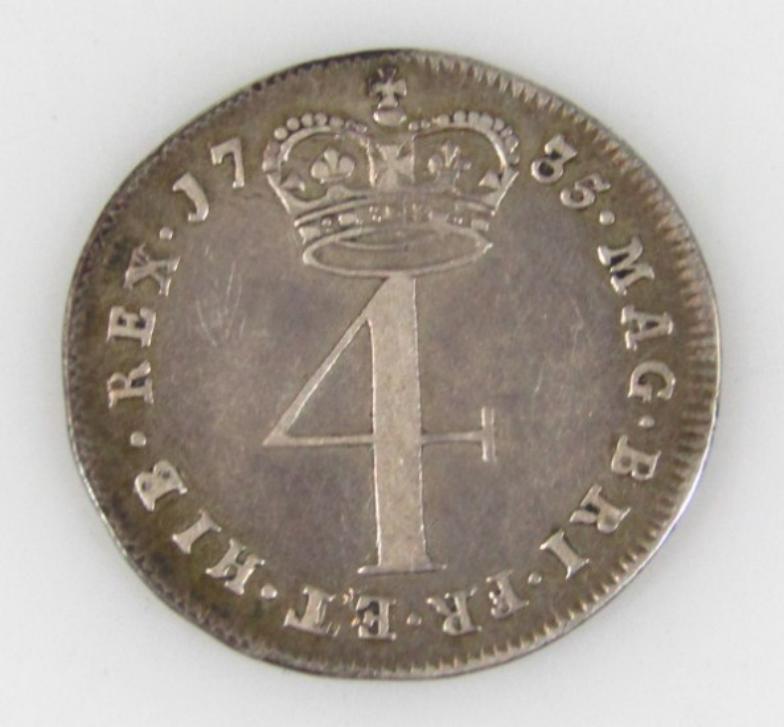 A George II silver Maundy 4d pence piece, dated 1735. (very fine)