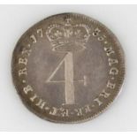 A George II silver Maundy 4d pence piece, dated 1735. (very fine)