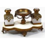 A 19thC Grand Tour style desk inkwell, on a figure of eight base, set with open urn and two