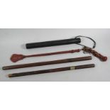 Two antique short sword sticks, baton and solid plaited riding crop. (4)