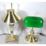 A modern brass table lamp, with green Perspex shade, of articulated form, on circular foot, 42cm