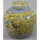 A Chinese porcelain famille jaune ginger jar and cover, in the early Qing style, the shouldered body