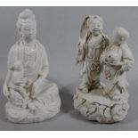 A 20thC Chinese semi porcelain blanc-de-chine figure, in flowing robes, aside dragon, with further