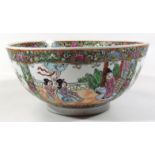 A 20thC Chinese famille rose bowl, of large proportion, the circular outline decorated with panels