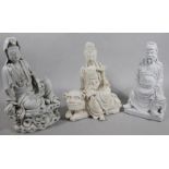 Three various 20thC Chinese semi porcelain blanc-de-chine figures, to include a gentleman seated, in