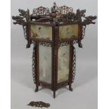 An early 20thC oriental hanging shade, with frosted glass painted with figures of geisha, etc., in