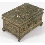 An early 20thC Chinese gilt metal casket, the removable lid raised with dragon, scrolls and flowers,