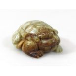 A 20thC Chinese jade style figure of a toad, with elaborate back, in crouched position, unmarked,