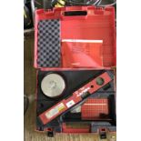 A Hilti PL10 level, with case