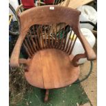 An Edwardian oak desk chair, two door painted cupboard, contents, garden bench, wire work