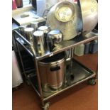 A stainless steel tea trolley.