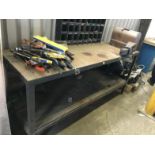 A steel work bench with vice.