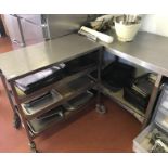 A stainless steel service trolley and two preparation tables, (3).