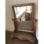 A pine dressing table mirror.