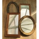 A Victorian gilt framed wall mirror, oval carved frame and two pine mirrors, (4).