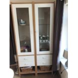 A pair of IKEA type part glazed display cabinets.