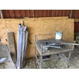 Assorted items, including matchboard sheets, wire top table, crate, bread crates, etc.