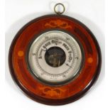 An early 20thC mahogany and marquetry circular hanging barometer, with 14cm diameter dial and