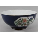 An early 18thC Kangxi style Chinese porcelain bowl, of large proportion, in powder blue with an