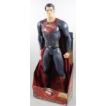 A modern Superman Man of Steel plastic figure, in partial cardboard packaging, 82cm high. (AF)