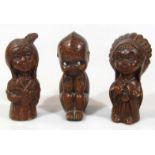 Three various early 20thC figure groups of miniature Native Indians, possibly decanters, with '