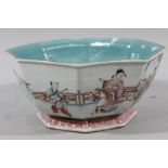 A Chinese porcelain Tongzhi period bowl, of octagonal outline with turquoise interior and underside,