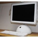 An iMac 20.5" monitor and keyboard.