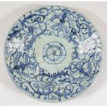 A Chinese porcelain Ming style dish, of circular outline decorated with an outer geometric pattern