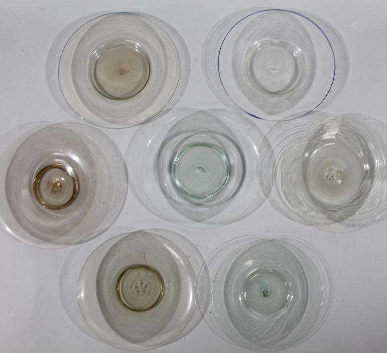 Seven various early 19thC glass saucers, each of dished outline with rough pontil marks, various - Image 2 of 2