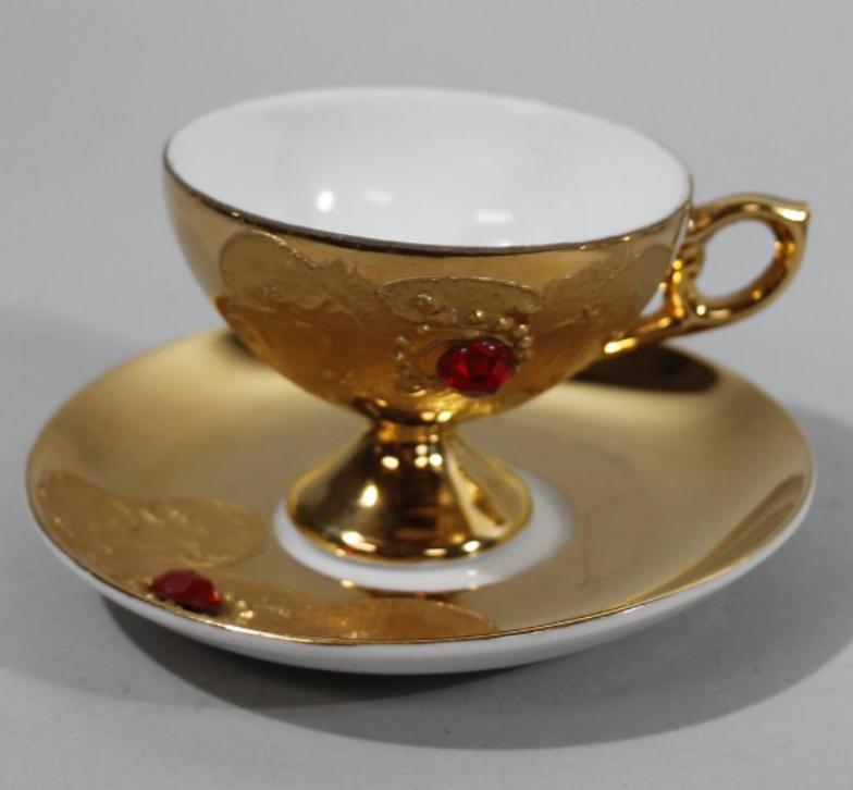 A mid 20thC gilt coloured part tea service, comprising cups and saucers, a Royal Worcester cabinet - Image 2 of 2