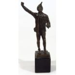 An early 20thC German bronze figure, signed Kriges Erzahalung Stimmungad Krirof, formed as a
