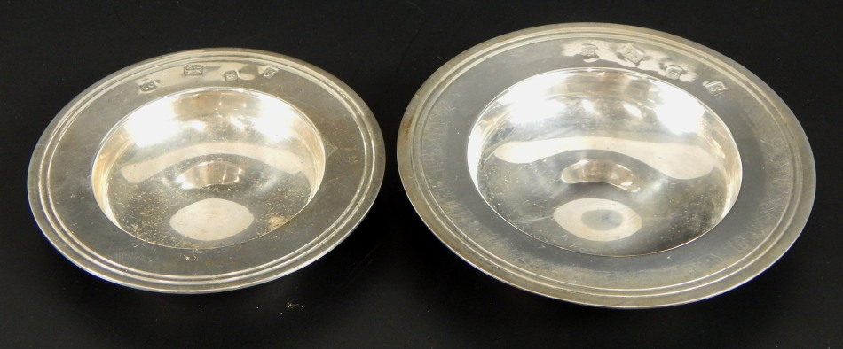 Two Queen Elizabeth II silver armada dishes, of graduated size, London 1953, 4oz, 9.5cm diameter and