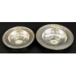 Two Queen Elizabeth II silver armada dishes, of graduated size, London 1953, 4oz, 9.5cm diameter and