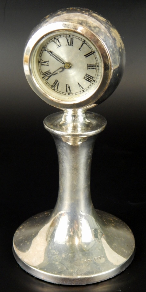 A George V cased silver timepiece, round clock dial, with Roman numerals, and black hands, Chester