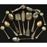 A collection of silver spoons and flatware, to include shell, thread and fiddle pattern spoons,