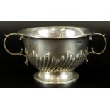A late Victorian silver loving cup, with reeded design, and two acanthus leaf handles, Birmingham